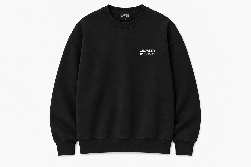 crowned-by-chaos-crewneck-black-front-view.png