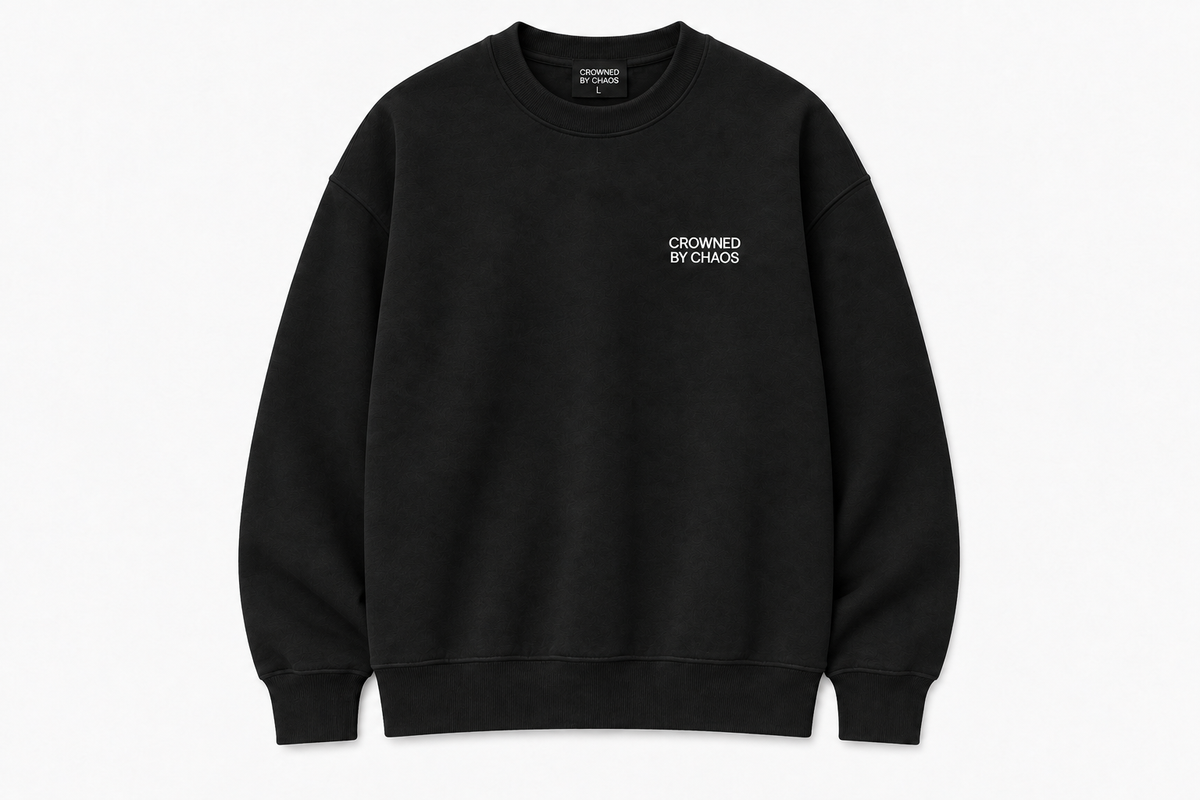 crowned-by-chaos-crewneck-black-front-view.png