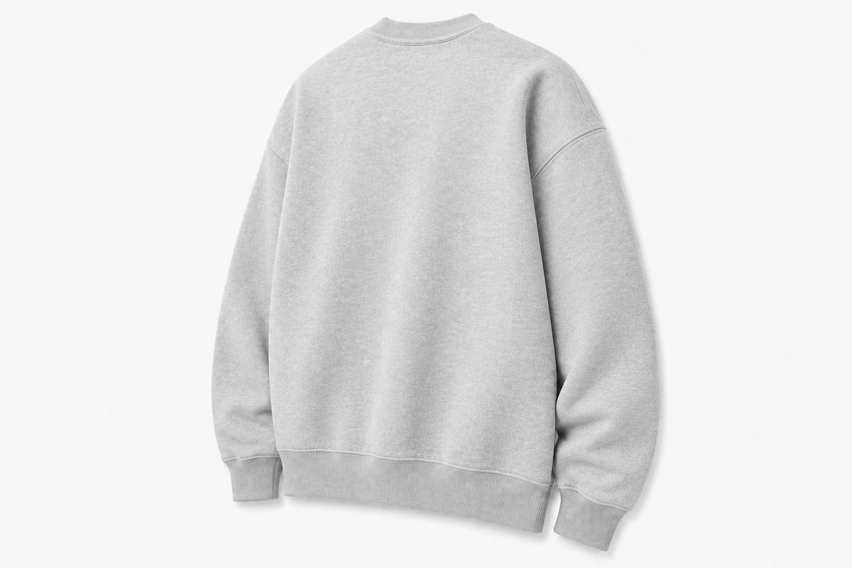 crowned-by-chaos-crewneck-heather-grey-back-3-4-view.png