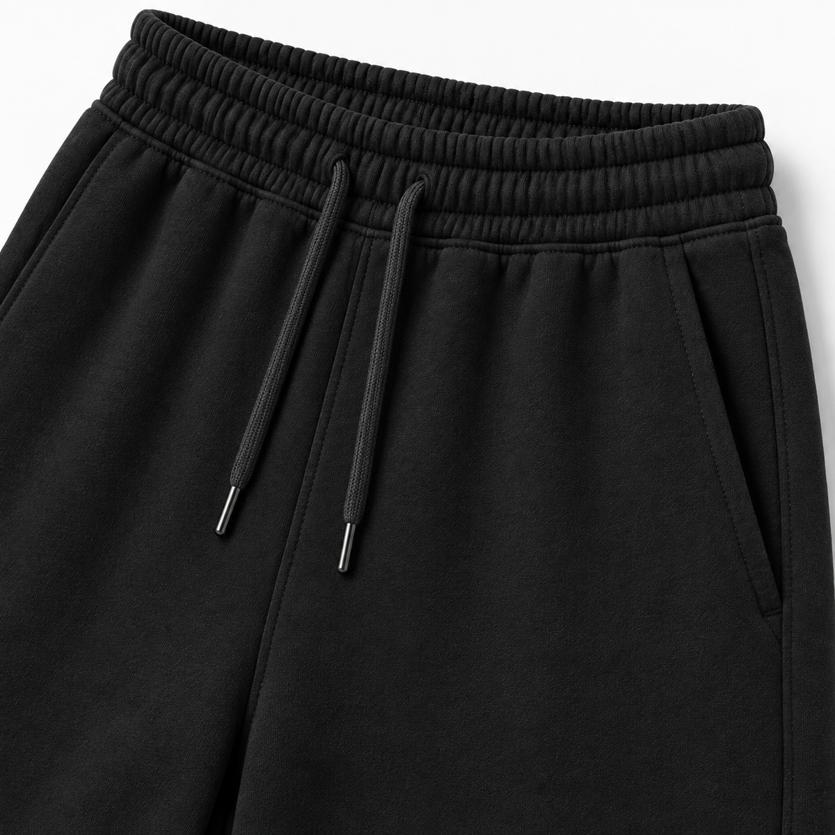 Détail de la taille élastiquée et du cordon du pantalon CROWNED BY CHAOS noir